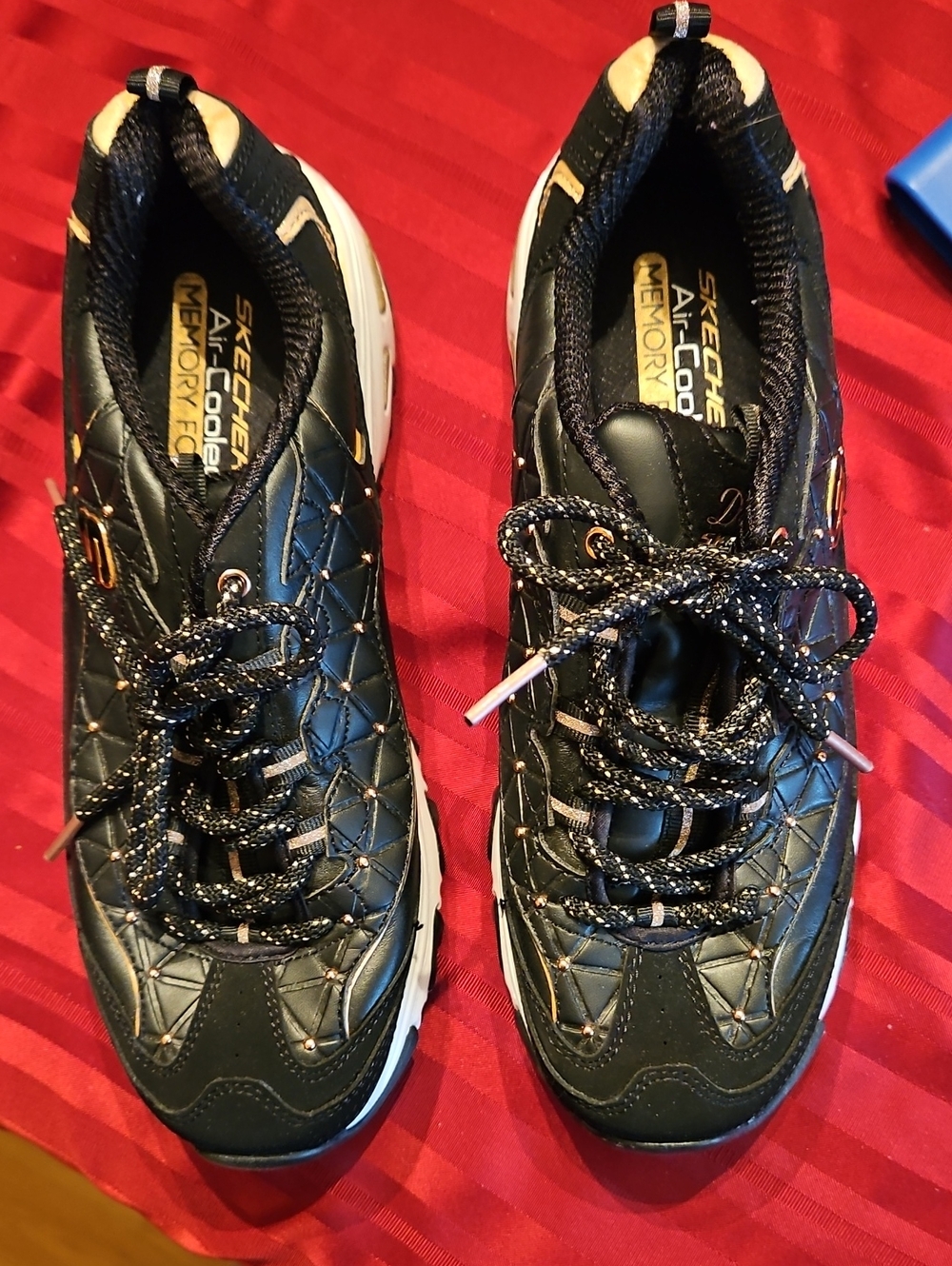 Skechers Quilted Black and Gold Lace-Up Women's Sneakers